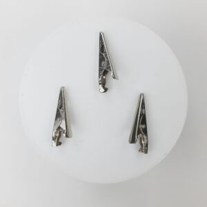 Broche para sujetar manteles o fotos