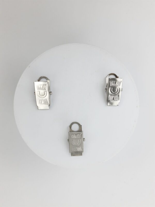 Broche para sujetar manteles o fotos