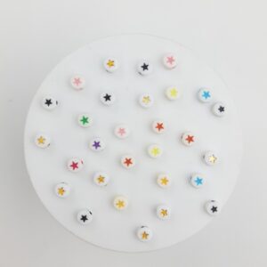 Pasantes en forma de pastillas con estrellas