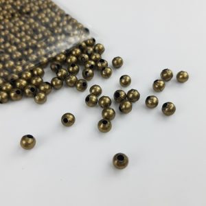 Bolitas de metal bronce