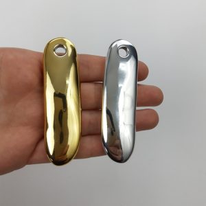 Dije con forma irregular